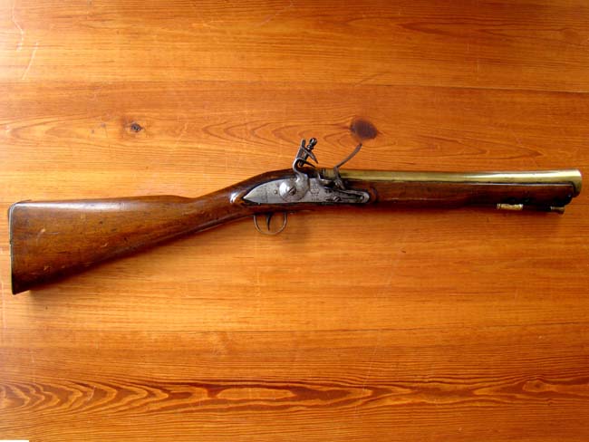 A rare Sea Service Pattern Flintlock Brass Barreled Blunderbuss by John Vaughan of London and dated 1741